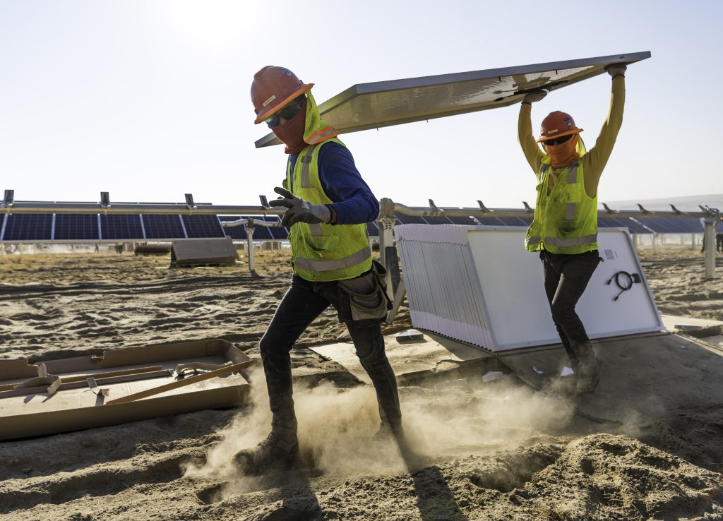 solar workers in the field